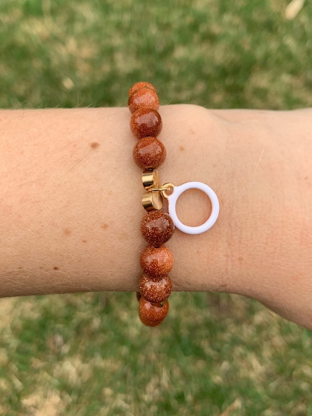 {Handmade} Brown Beaded Bracelet with White Ring Charm